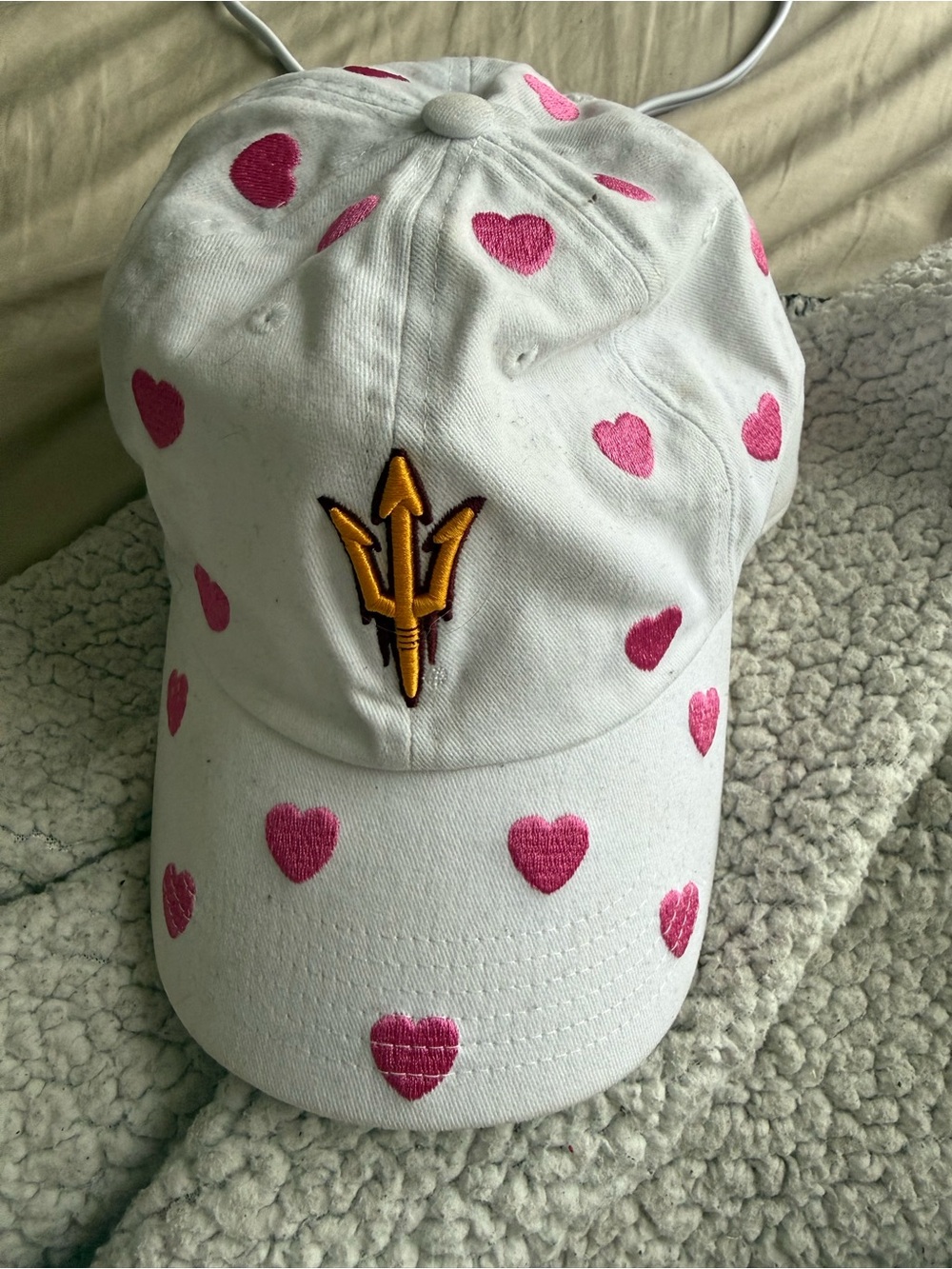 White ASU Cap with Pink Hearts and Gold Trident Accent